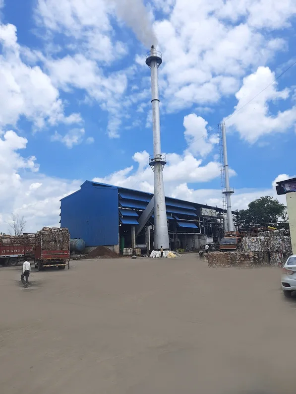 Industrial utilities building and chimney at a paper mill